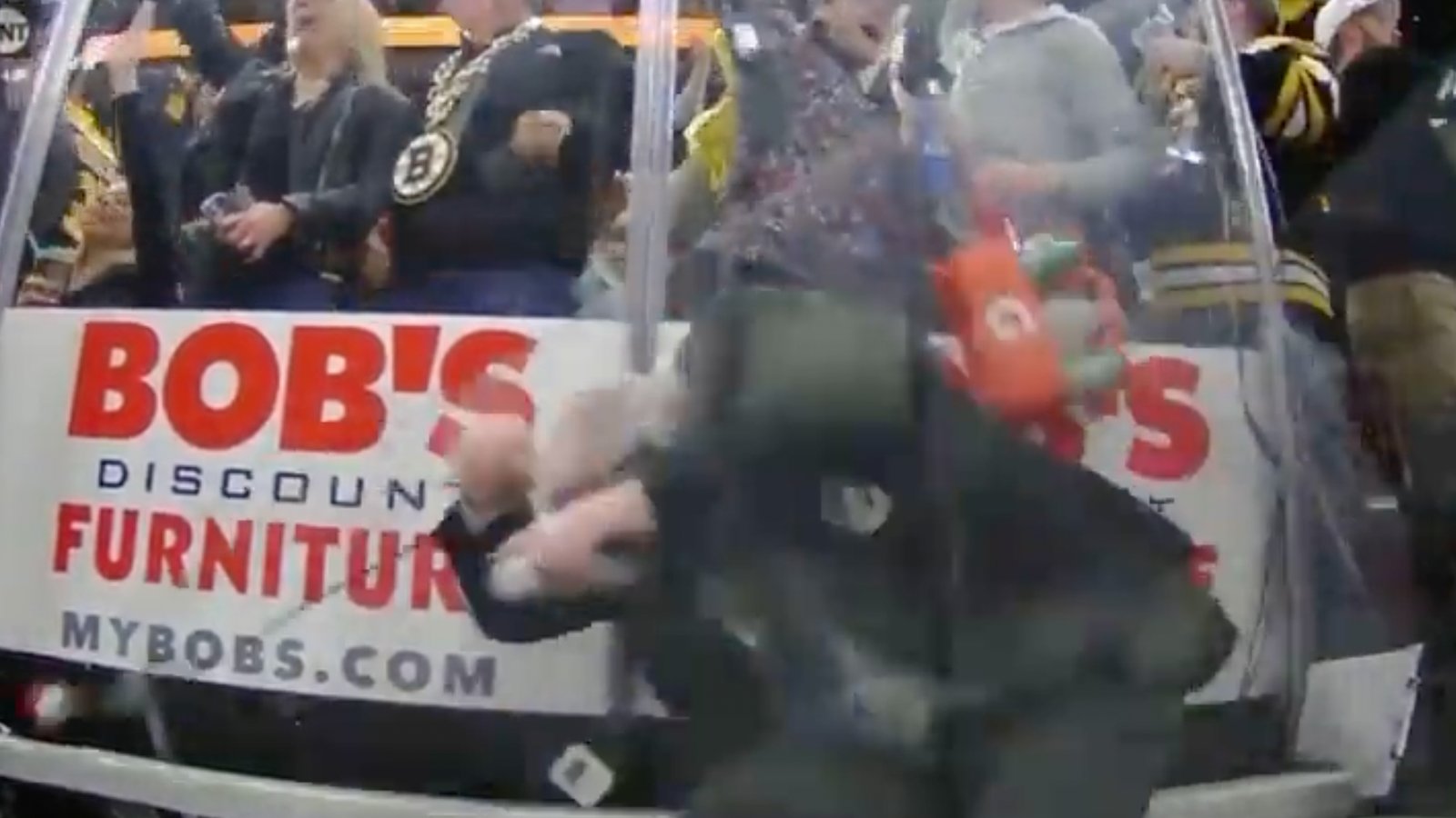 Glass falls on NHL official, knocks him out cold, leaves on stretcher