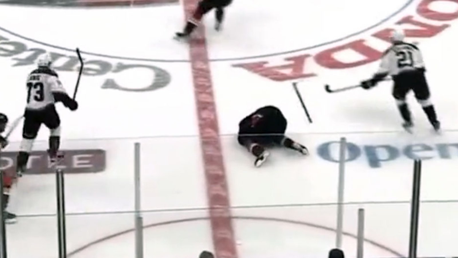 Trevor Zegras gets absolutely obliterated at center ice, fight breaks out