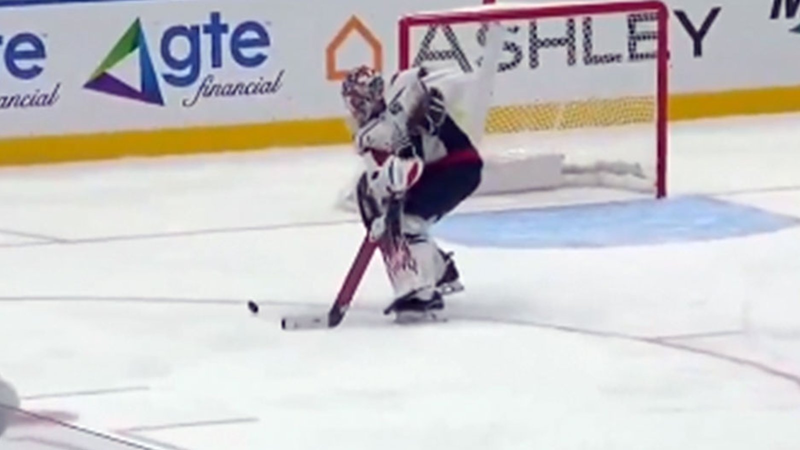 Charlie Lindgren fires the puck into his own net!