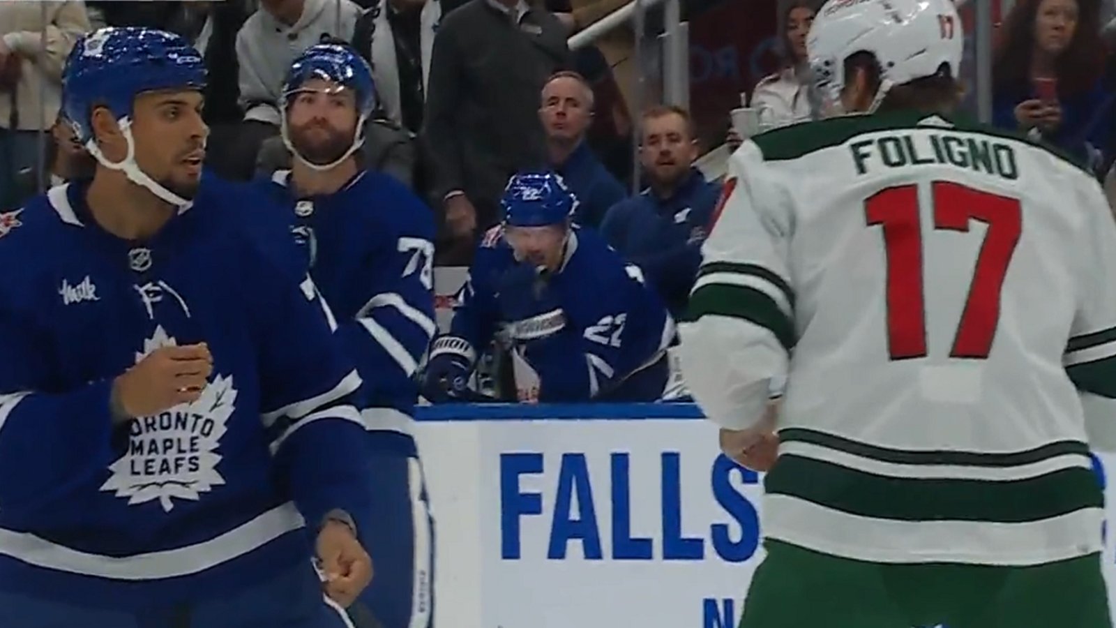 Ryan Reaves drops the gloves with former teammate Marcus Foligno.