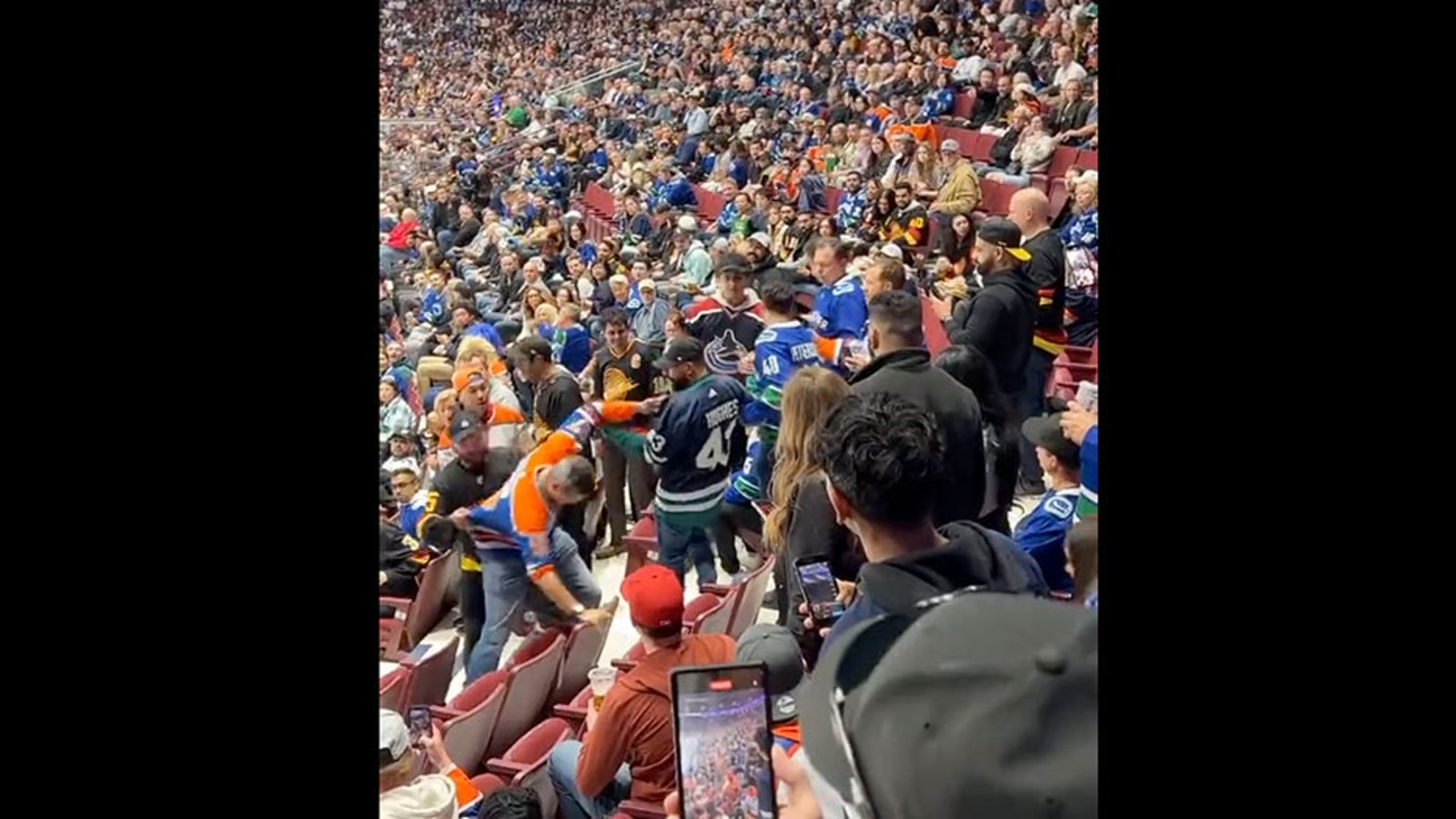 Canucks and Oilers fans start a brawl last night in Vancouver