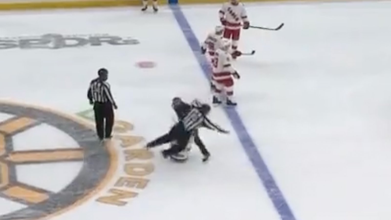 Bruins ice employee collides with official during Game 3