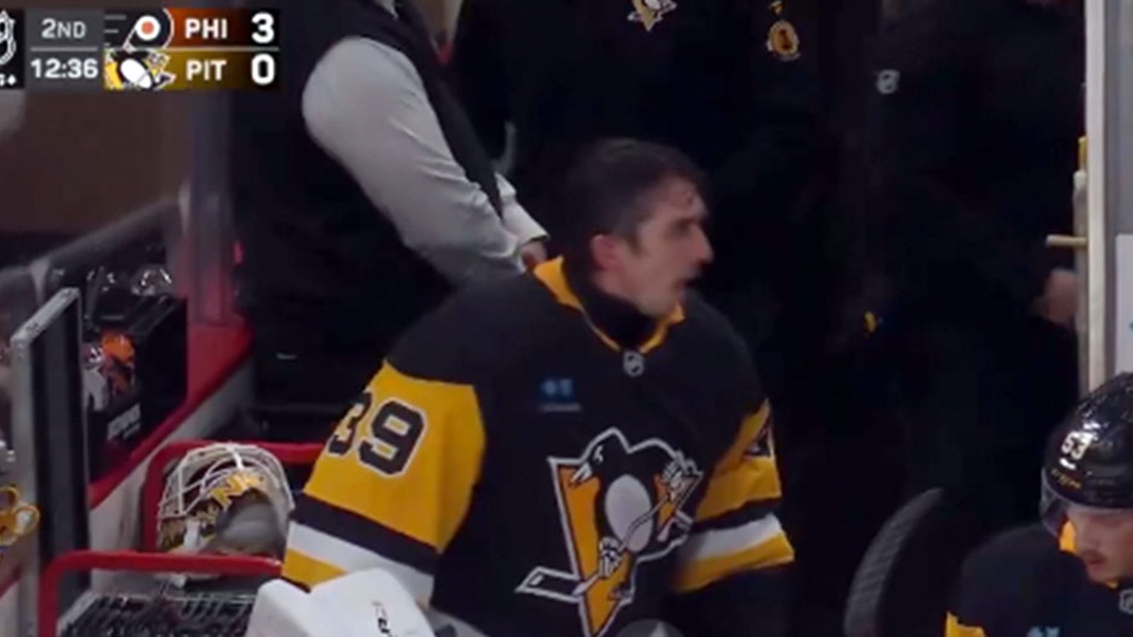 Nedeljkovic smashes his stick, slams the bench door and screams at his teammates after getting pulled