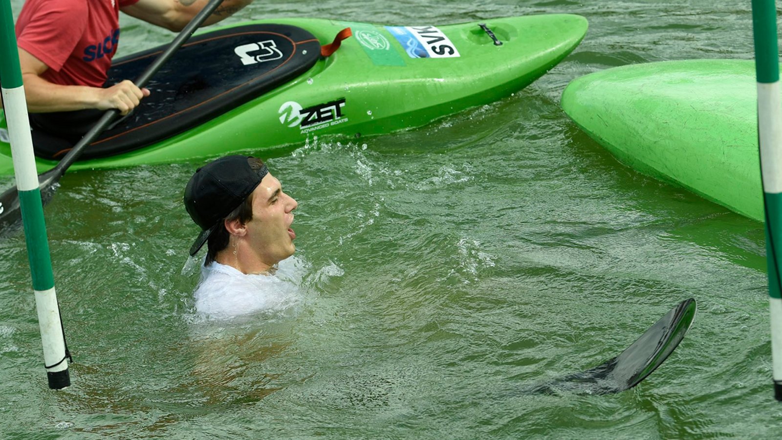 Juraj Slafkovsky tries his luck at kayaking... goes swimming.