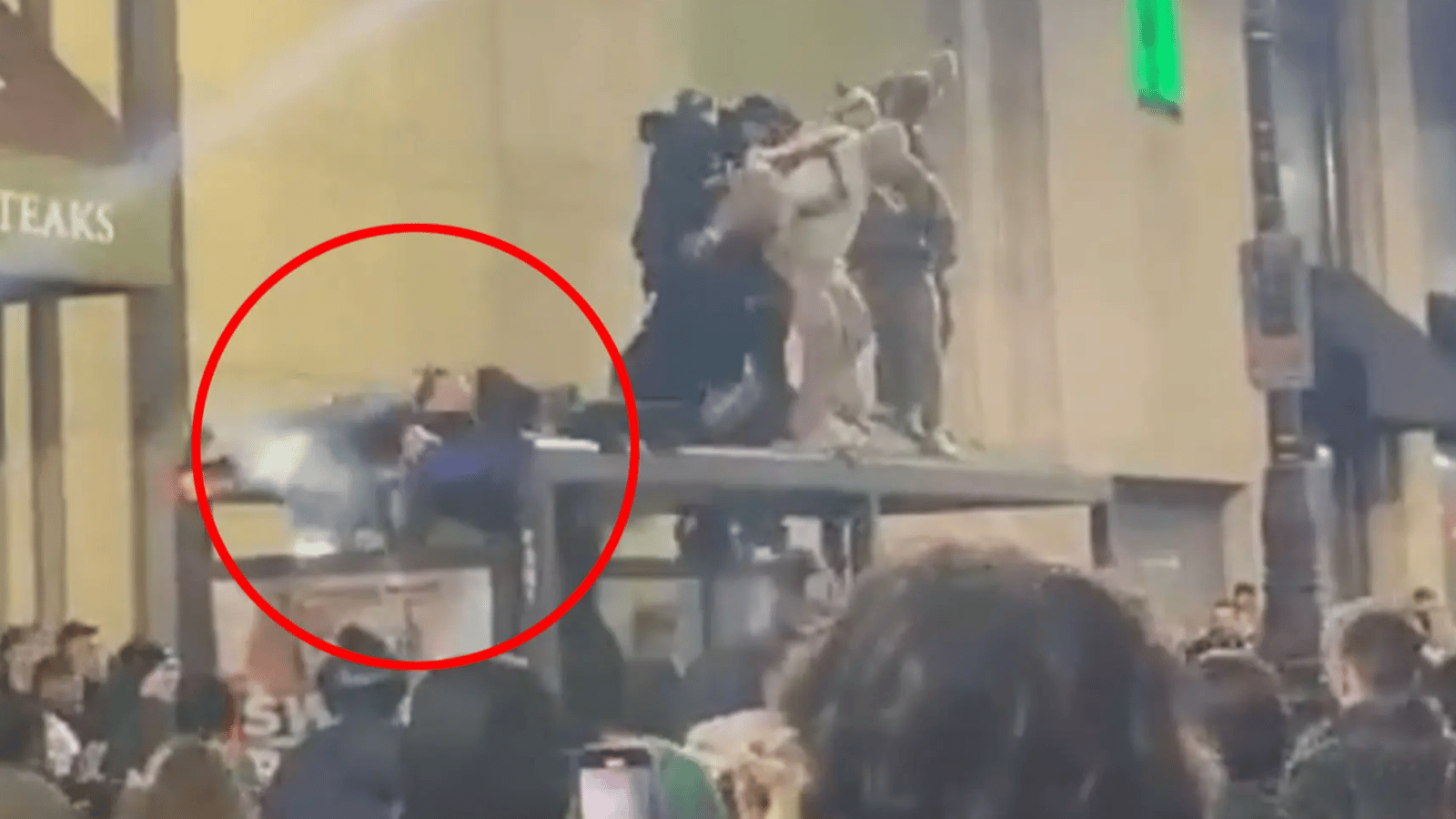Eagles fans injured after crashing through bus stop roof 