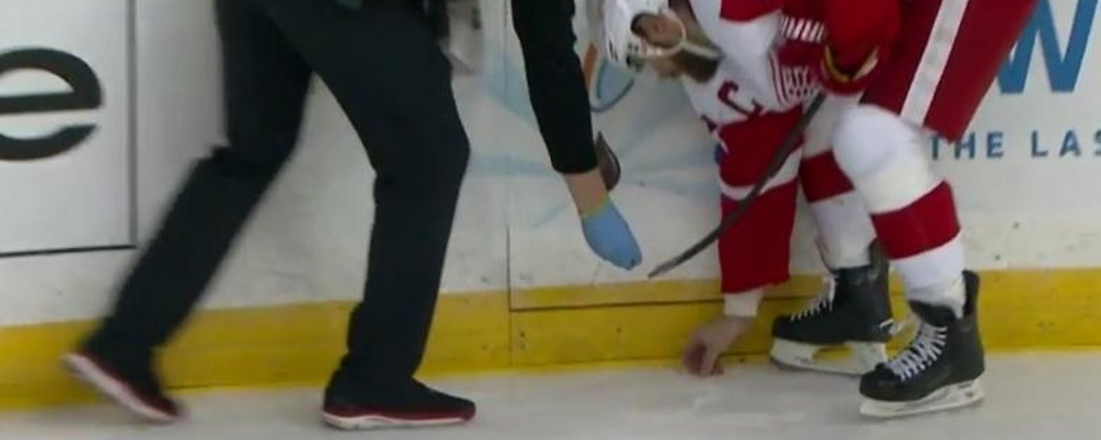 Watch as Henrik Zetterberg picks up Pavel Datsyuk's teeth off the ice.