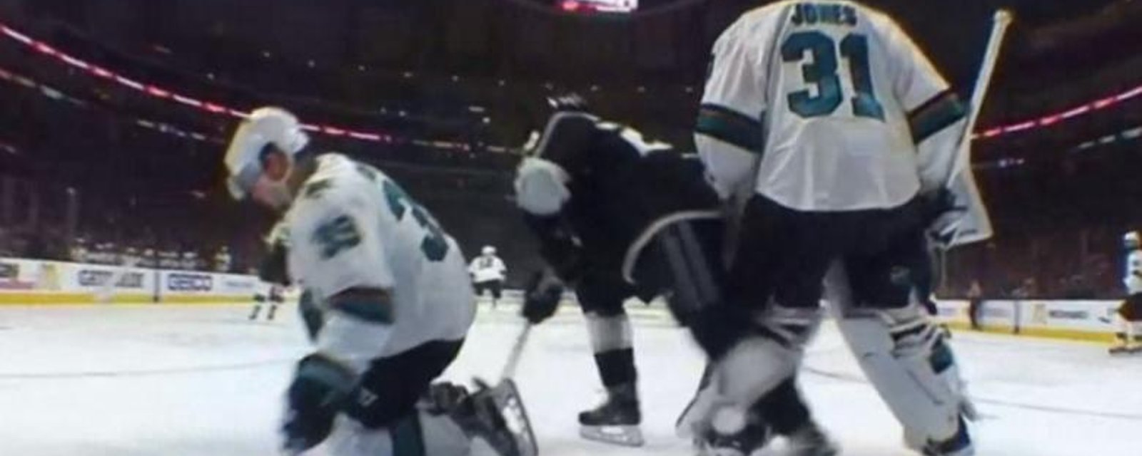 Kings try and take out Sharks goaltender Martin Jones with a brutal slew foot.