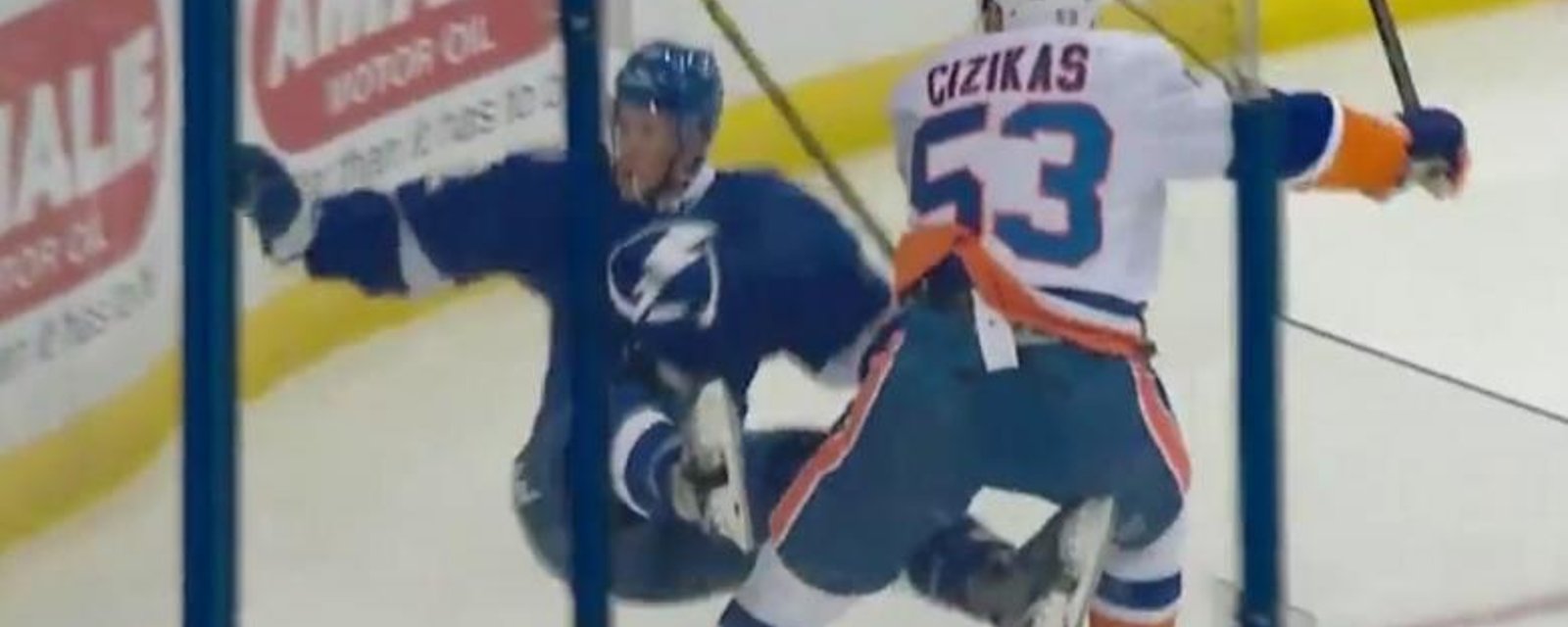 Cizikis destroys Condra with a crushing hit into the boards.