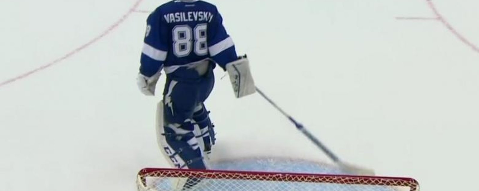 Lightning goalie throws his stick towards the bench to let his team know he's not happy.