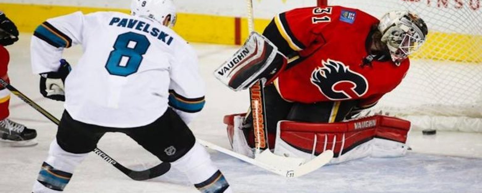 Flames lose high scoring affair against Sharks.