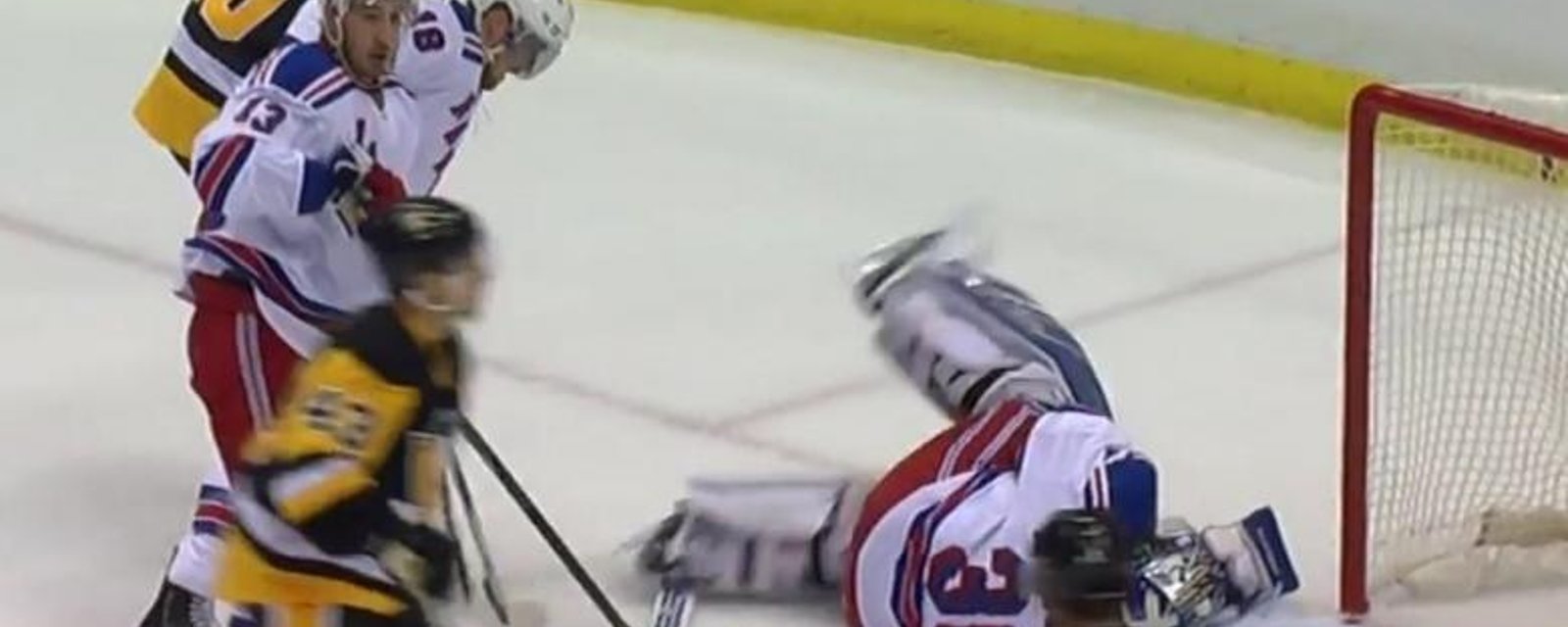 Lundqvist gives up a goal after being poked in the eye by his teammate.