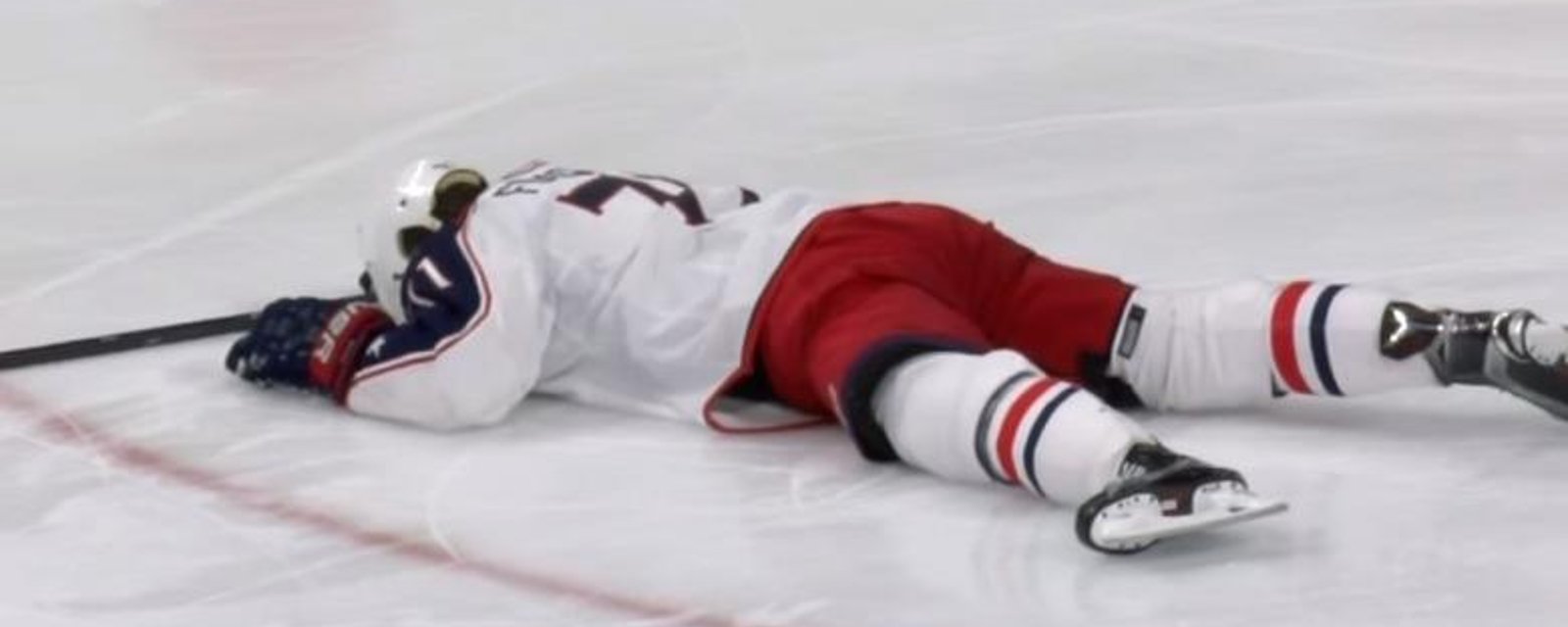 Player knocked out after taking a hit right on the chin.