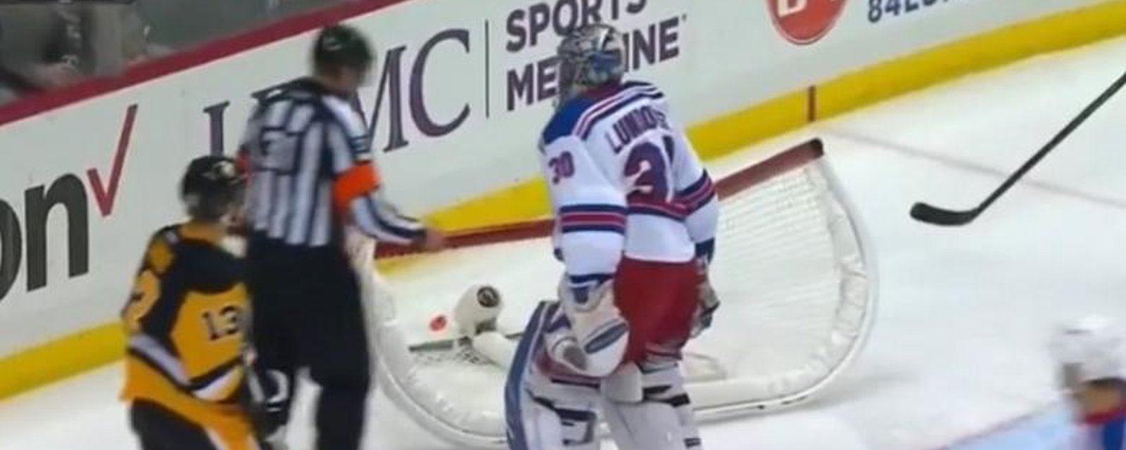 Lundqvist loses it, knocks over his own net during play.
