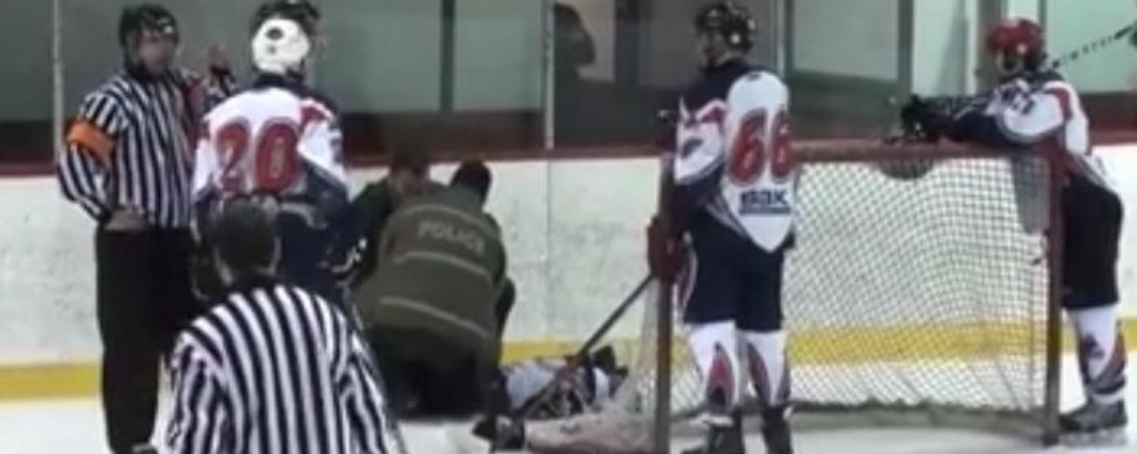 Player handcuffed and arrested while still on the ice!