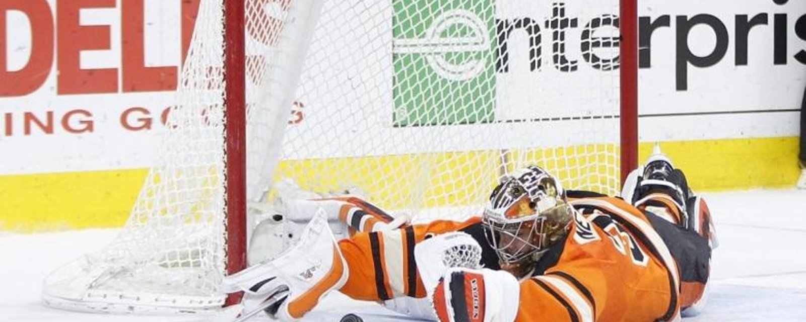 Neuvirth with a beautiful old school poke check in the shoot out.