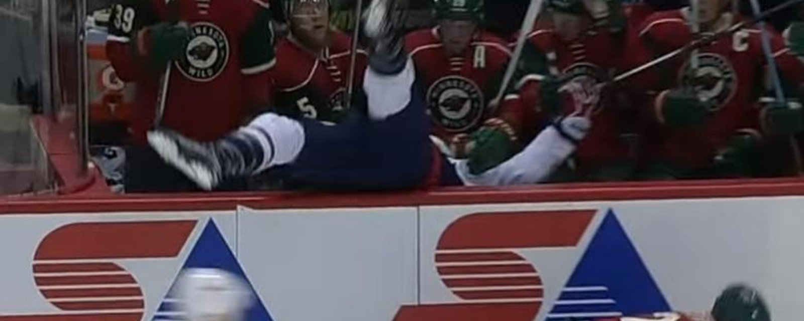 Nino Niederreiter sends Wilson into the Wild bench with a huge hit.