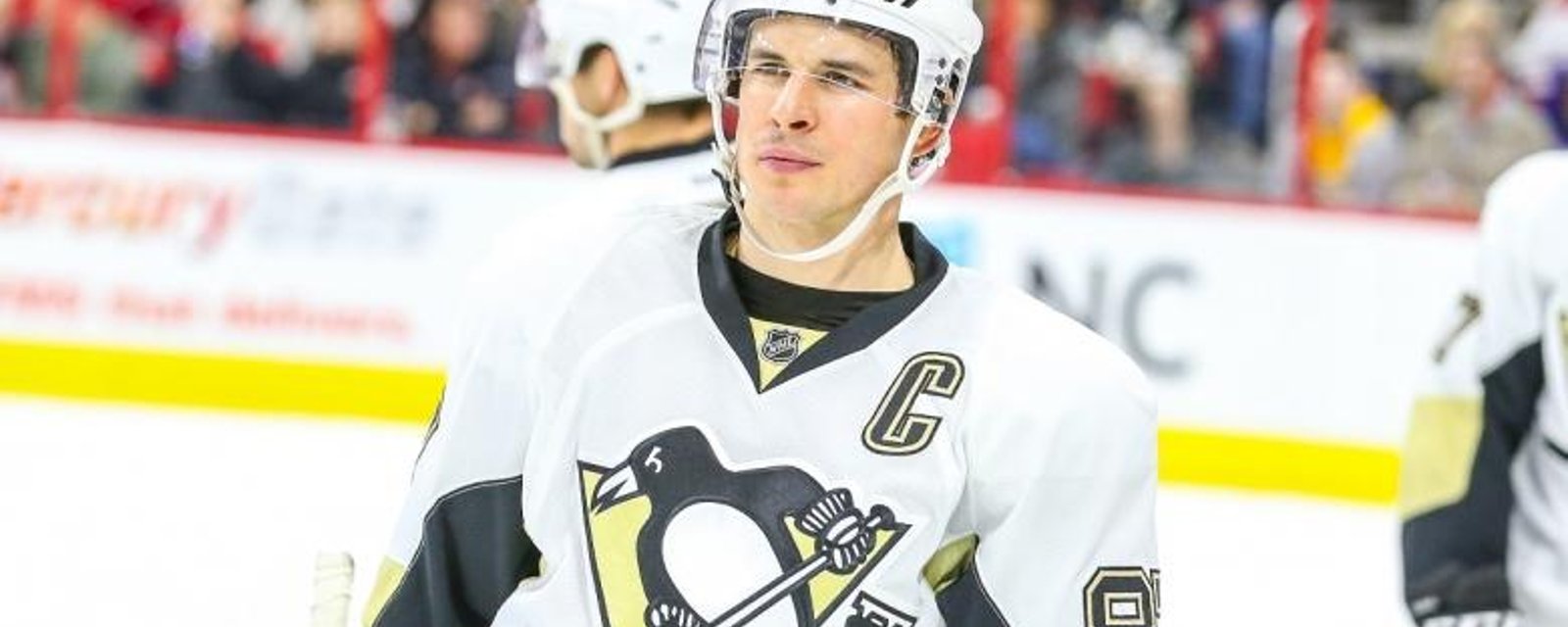 Dragged down from behind, Crosby still scores a ridiculous goal.