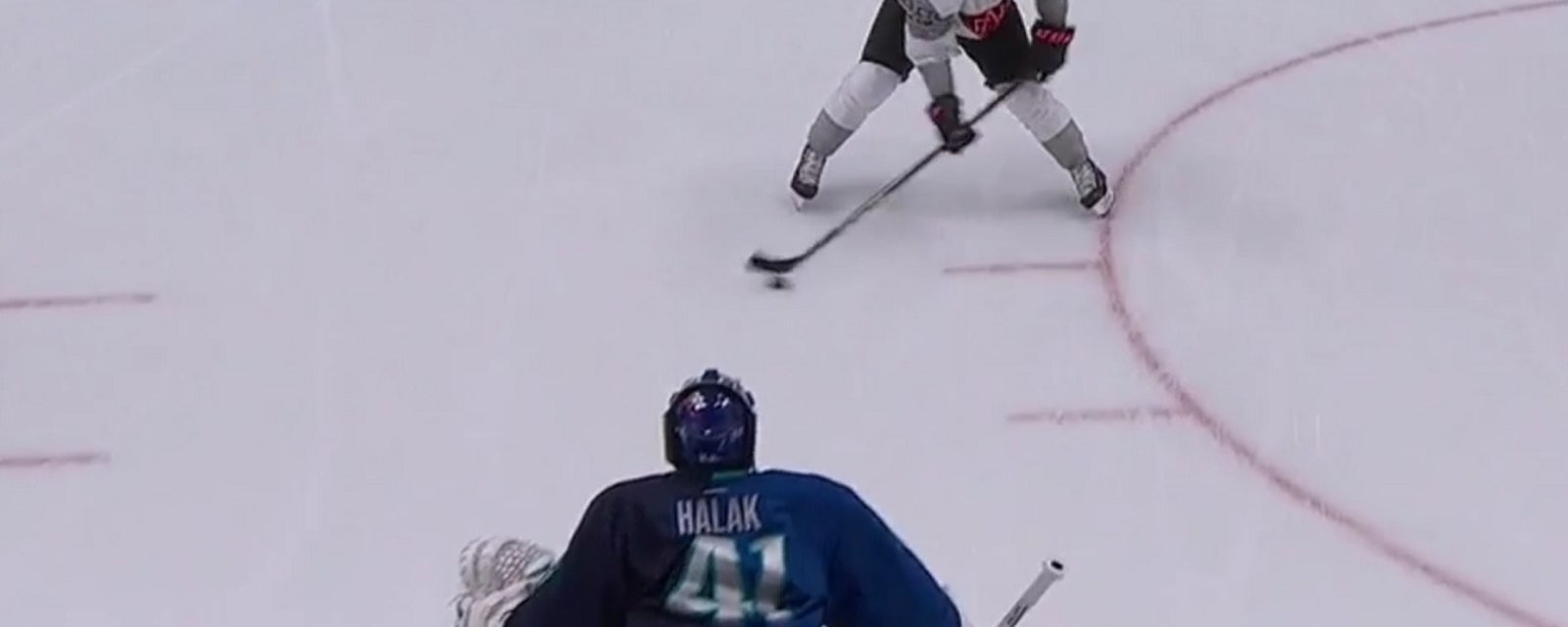MacKinnon completely undresses Halak on filthy penalty shot..