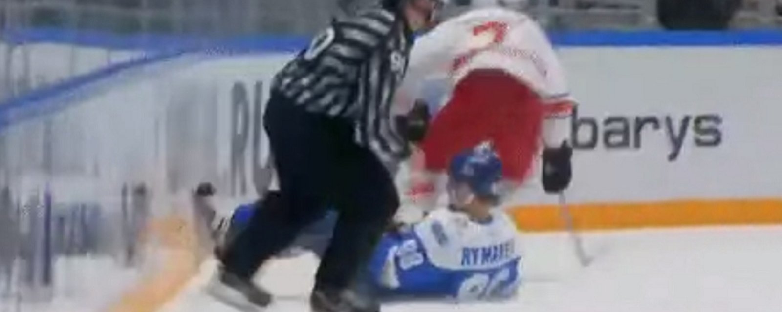 What the hell? KHL linesman delivers a nasty hit to unsuspecting player.