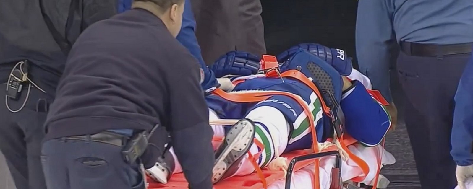 Update: Thunderous hit leads to player leaving the ice on a stretcher Tuesday night.