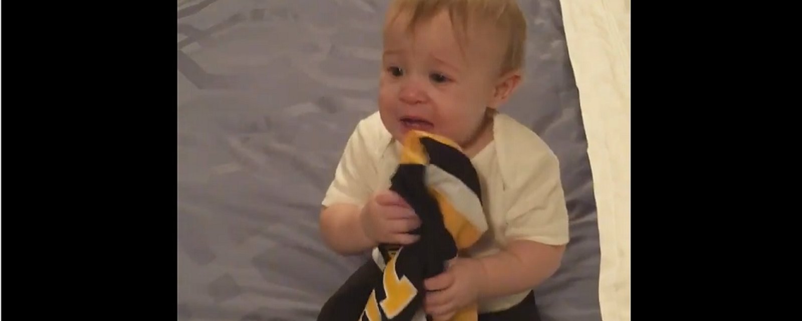 Little girl throws a tantrum when parents try to take away her favorite NHL jersey.
