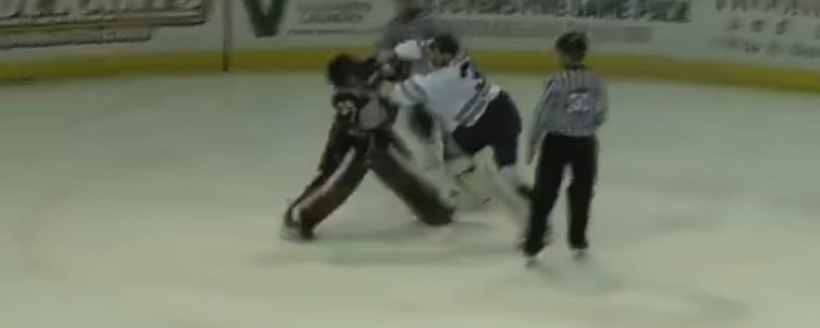 Two goalies throw down after a stoppage in play.