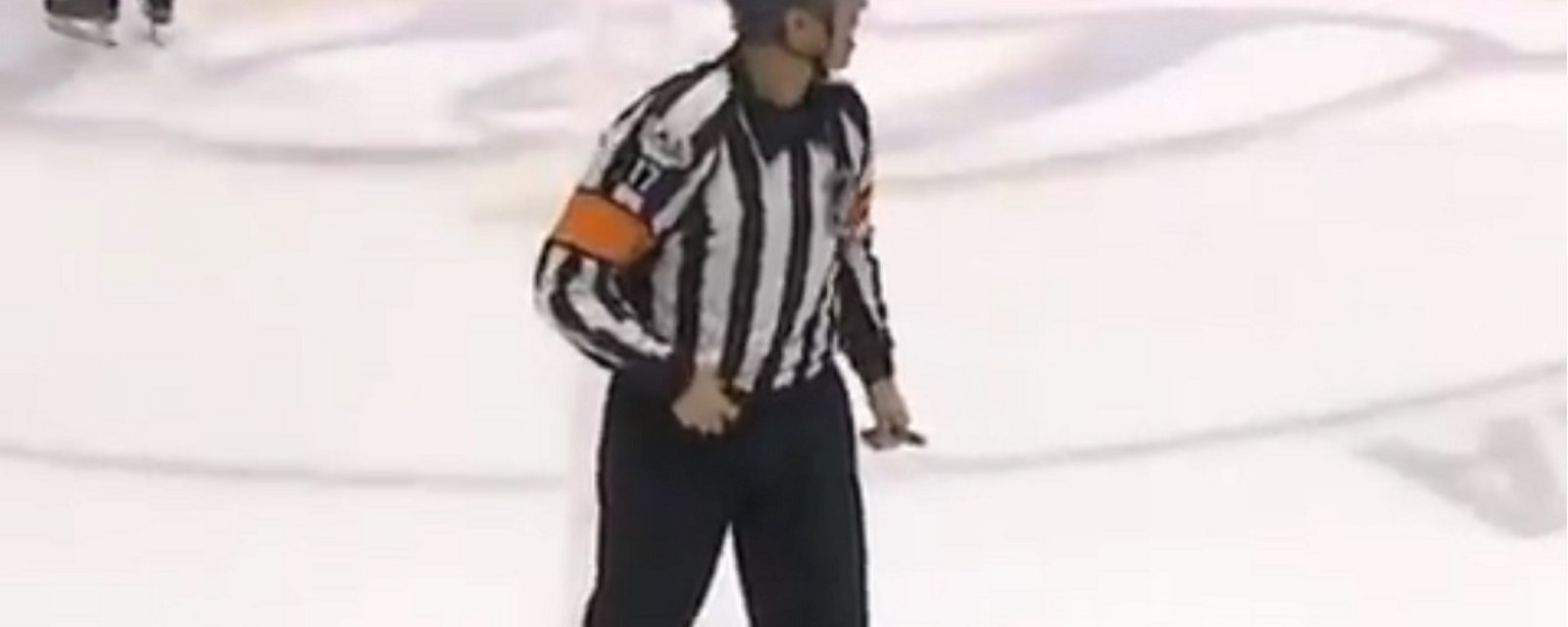 NHL official caught cursing at player on live mic.