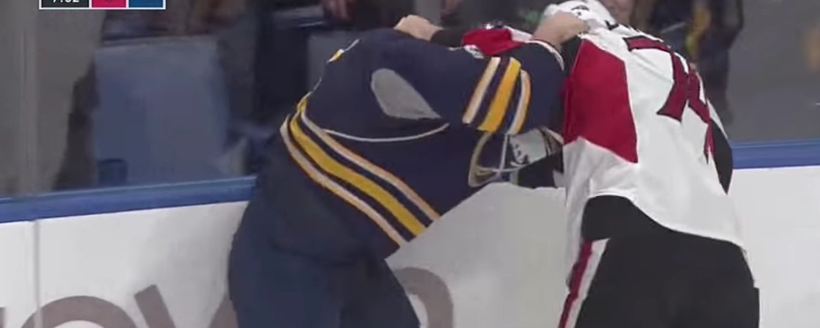 Sabres' Foligno and Sens' Borowiecki throw down in big time fight.