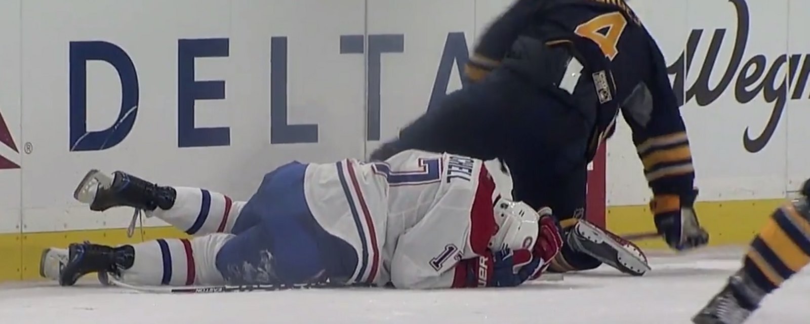 Habs Mitchell takes a brutal knee to the head from former Hab Georges.