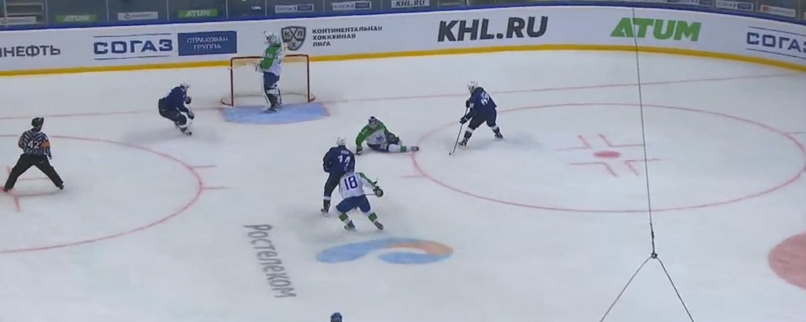 Goalie takes a drink of water in the middle of a three on one against him.