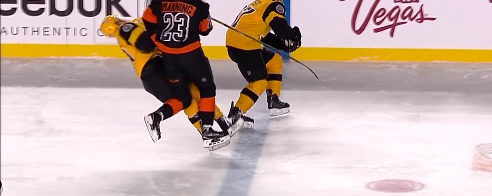Player crushes his opponent with a devastating open-ice hit.