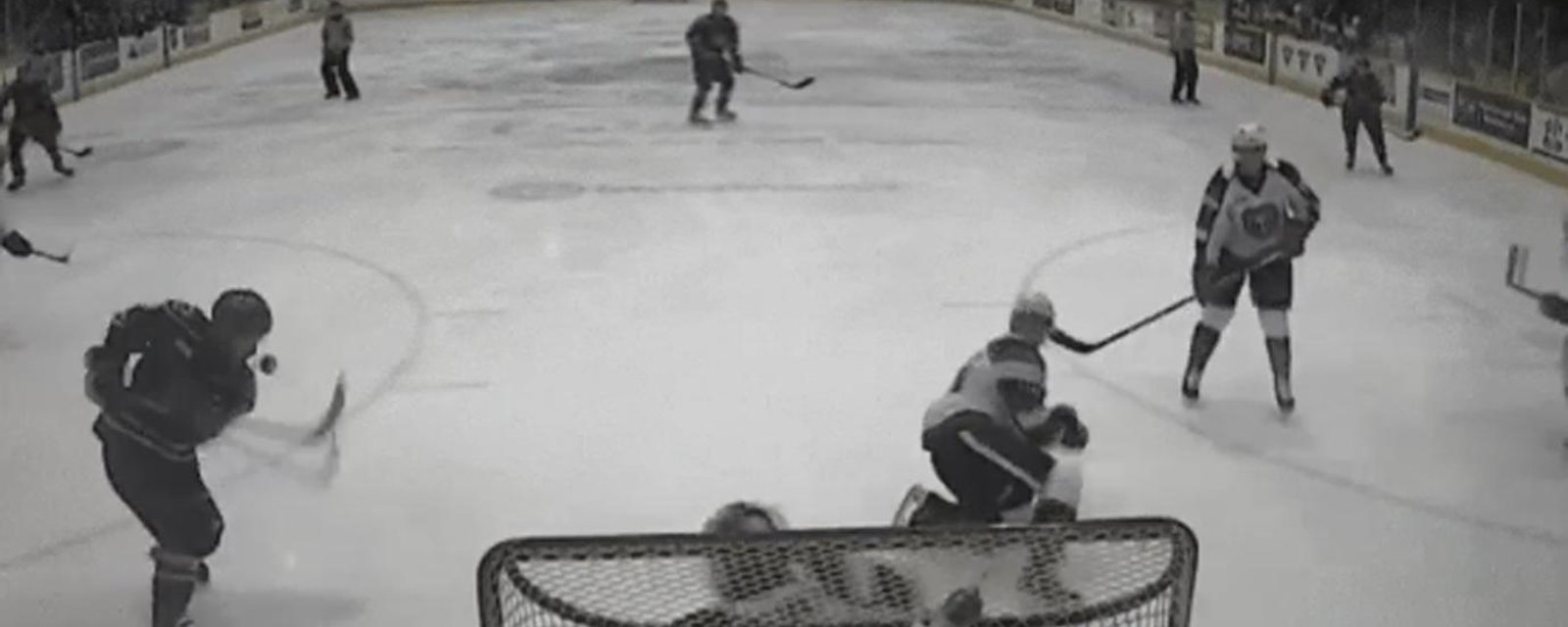 Junior hockey player find creative way to score. 