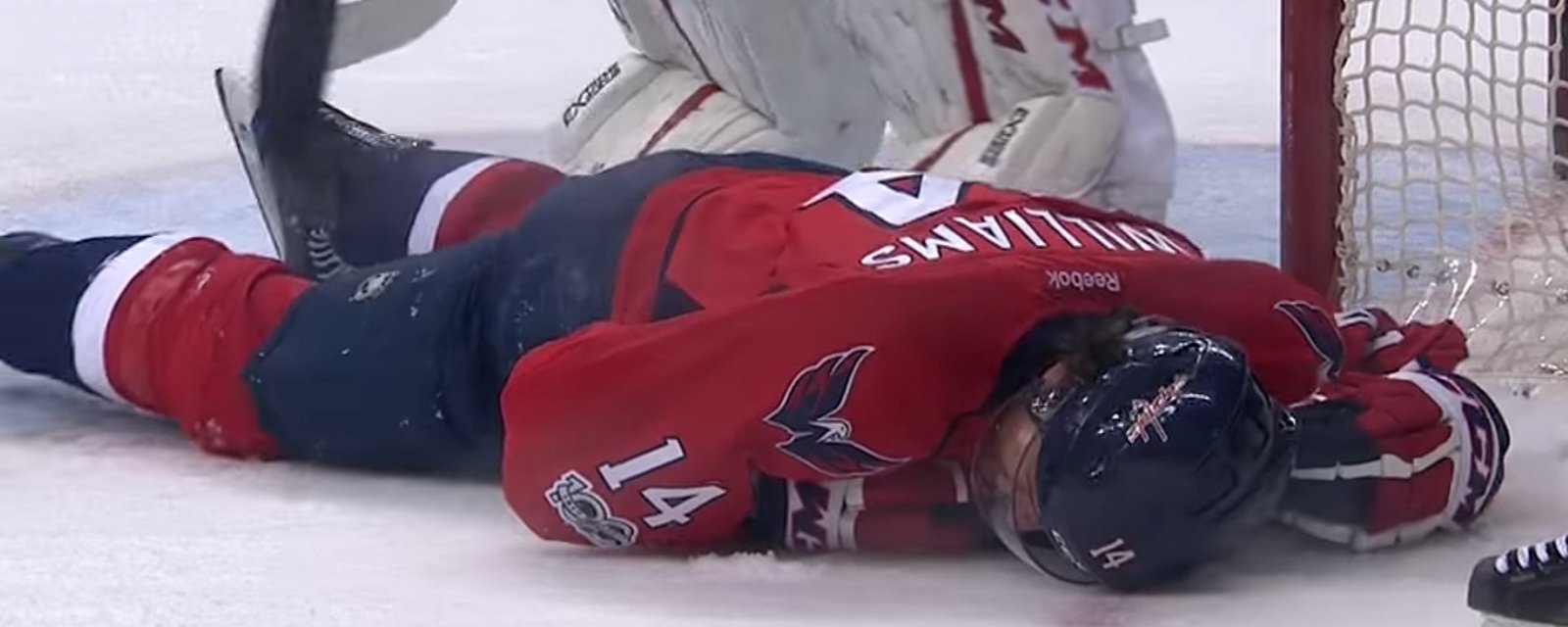 OUCH! Williams goes down after eating a one-timer in the head.