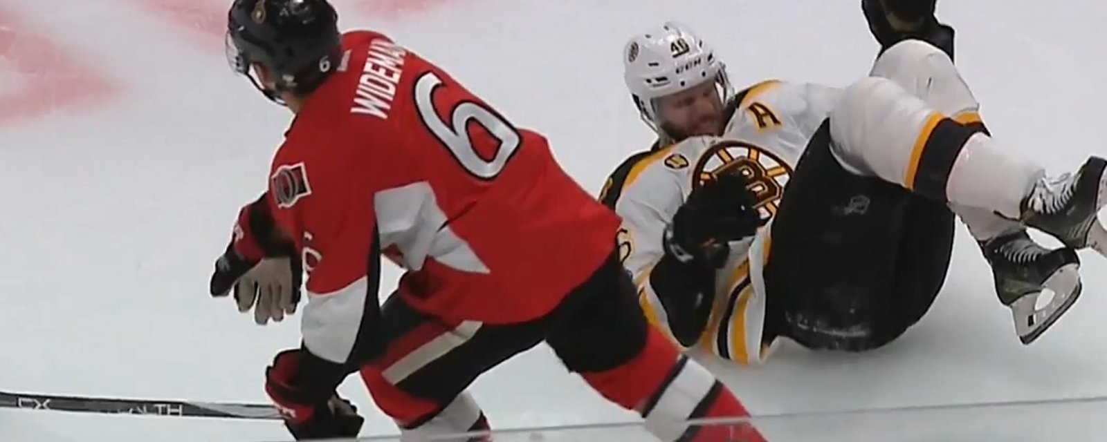 Breaking: Boston loses one of their top forwards after blatant knee on knee hit.