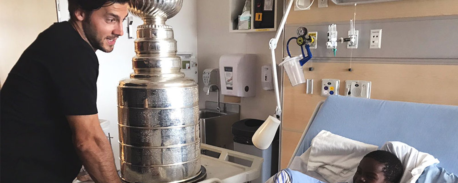 Pens’ Letang shares the Cup with some special fans