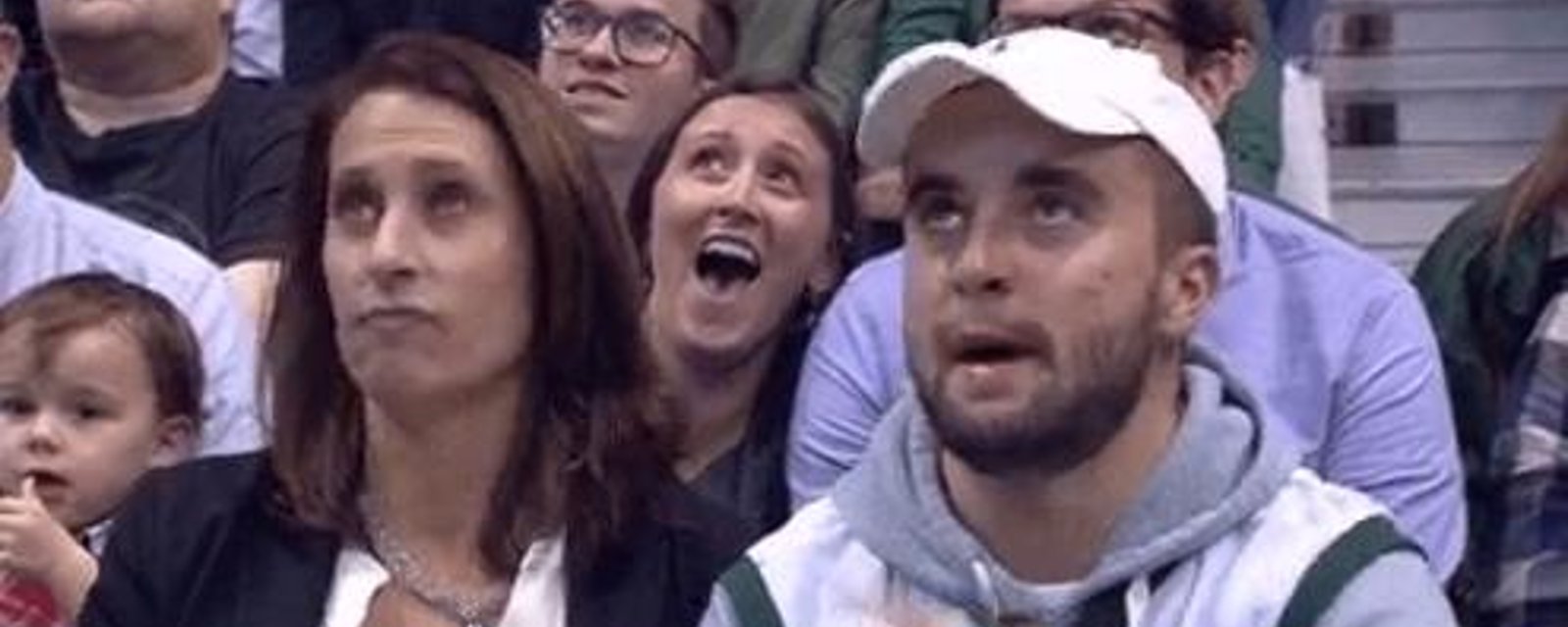 Awkward moments as mom and son are showed on kiss cam! 