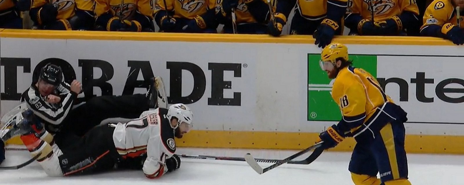 NHL official gets run over after big hit on Ryan Kesler.