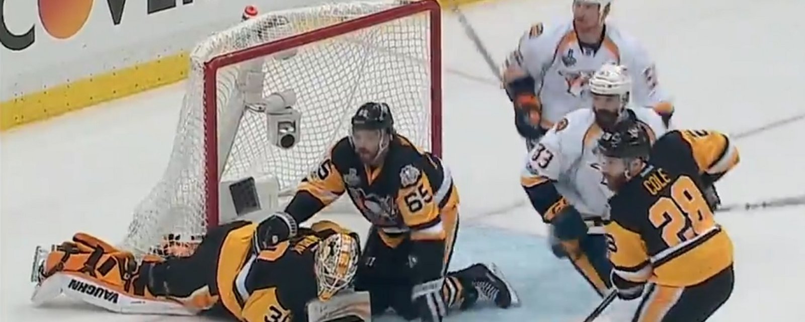 Penguins goalie slow to get up after taking the post right between his legs.