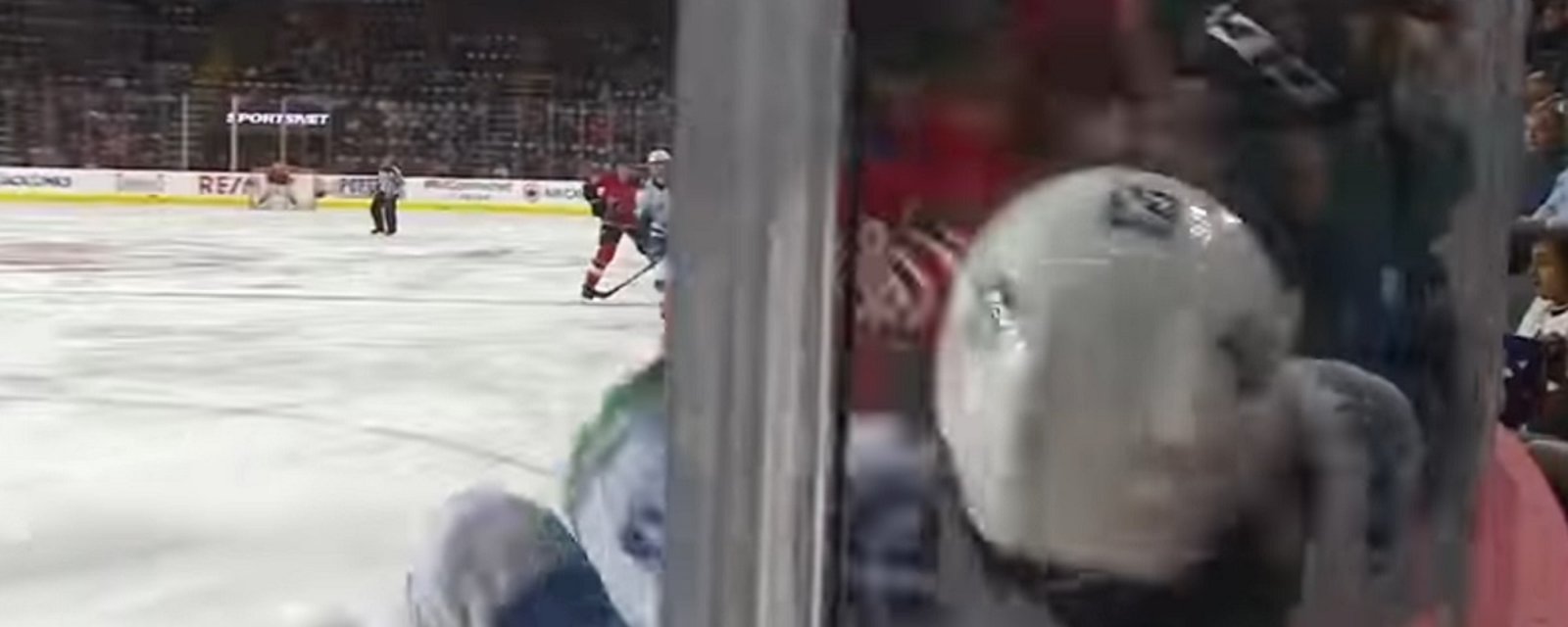 Tanner Glass crushes his opponent against the boards, and scores while he's still down!