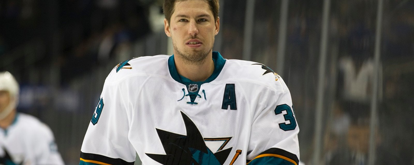 Sharks' star forward limps off the ice after being injured in practice.