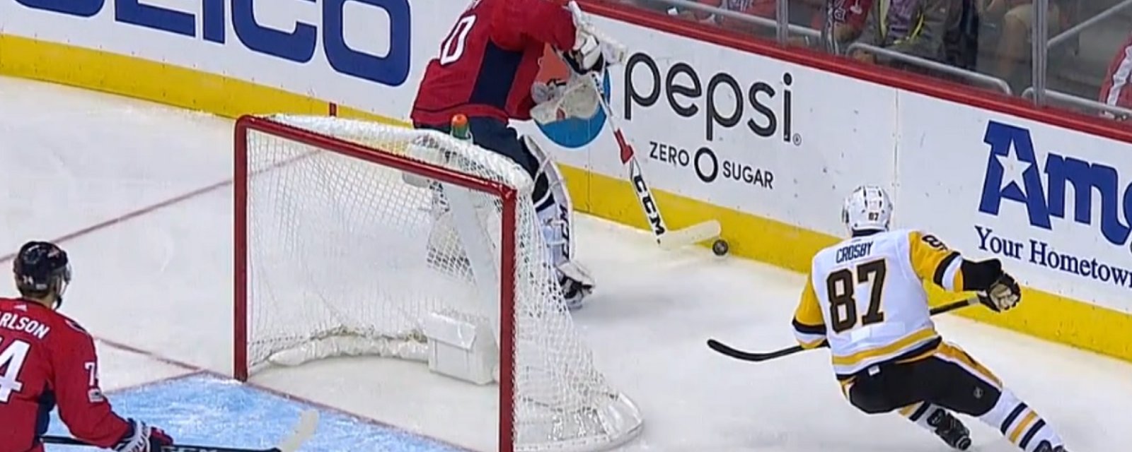 Breaking: Sidney Crosby bumps and knocks down Braden Holtby.