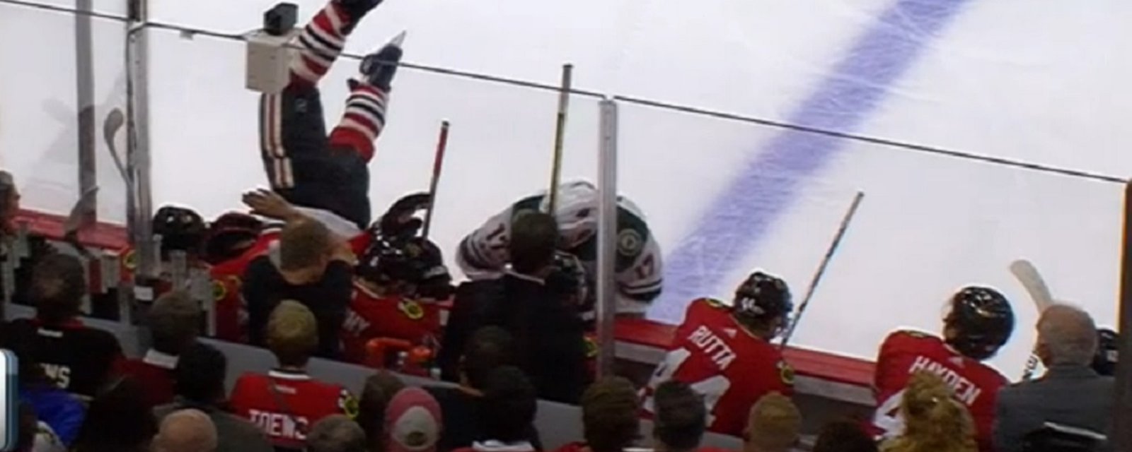 Brent Seabrook gets sent head first into the Blackhawks' bench.