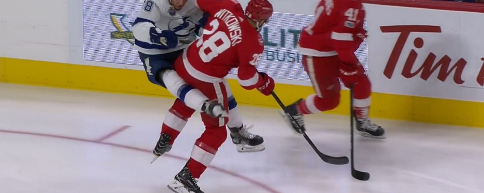 Huge hit from Witkowski sends NHL rookie flying through the air.