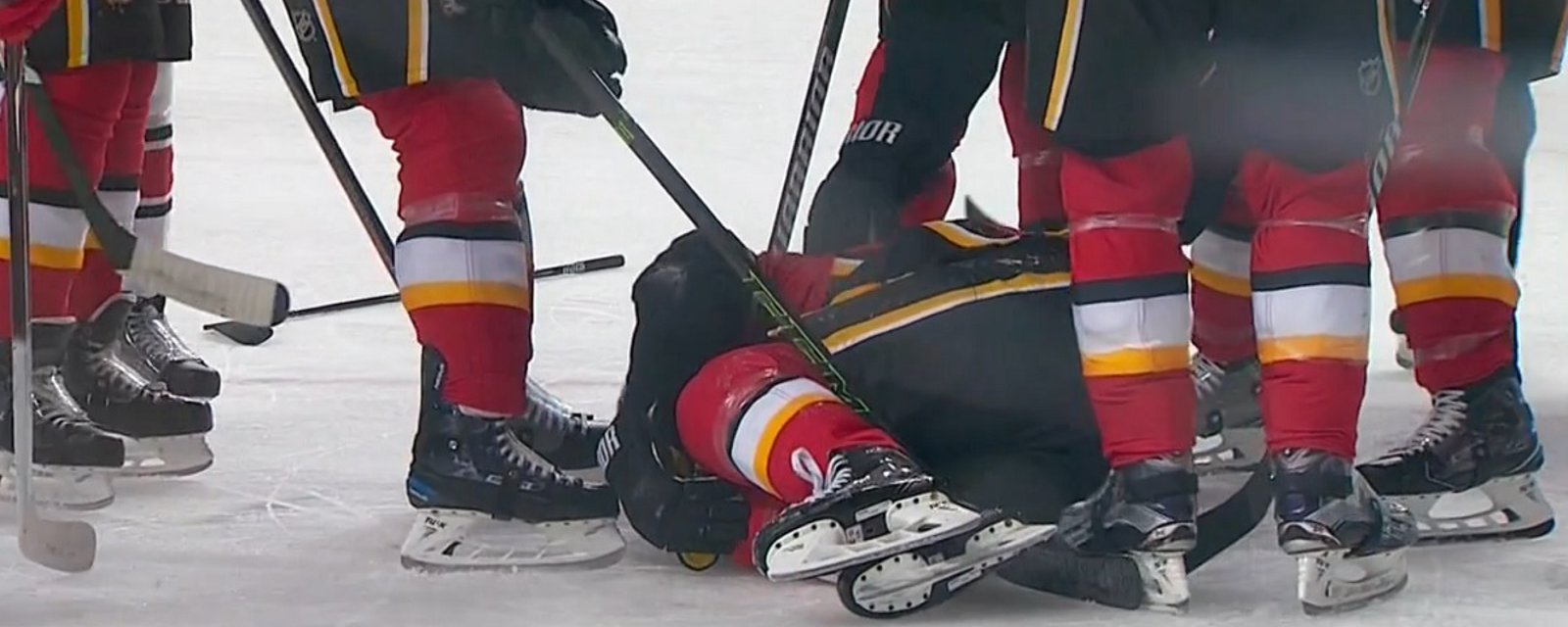 Breaking: NHL veteran goes down with a knee injury, then takes a slap shot to the head.
