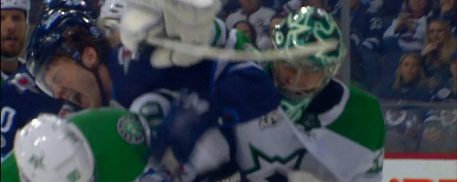 Ben Bishop punches Lemieux right in the face with his blocker. 