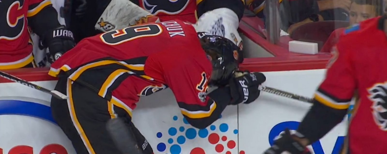  Flames star Matthew Tkachuk injured after being crushed in front of his own bench.