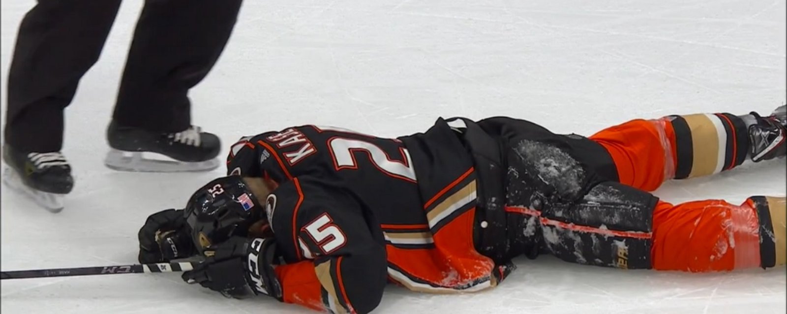 Young NHLer gets knocked out by a monster hit on Tuesday night.