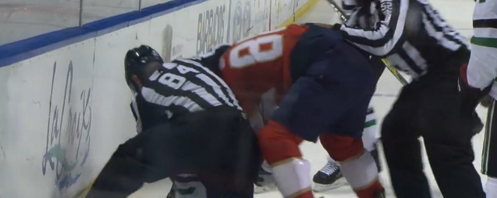 NHL officials step in to save Roussel who gets completely dominated by McGinn.