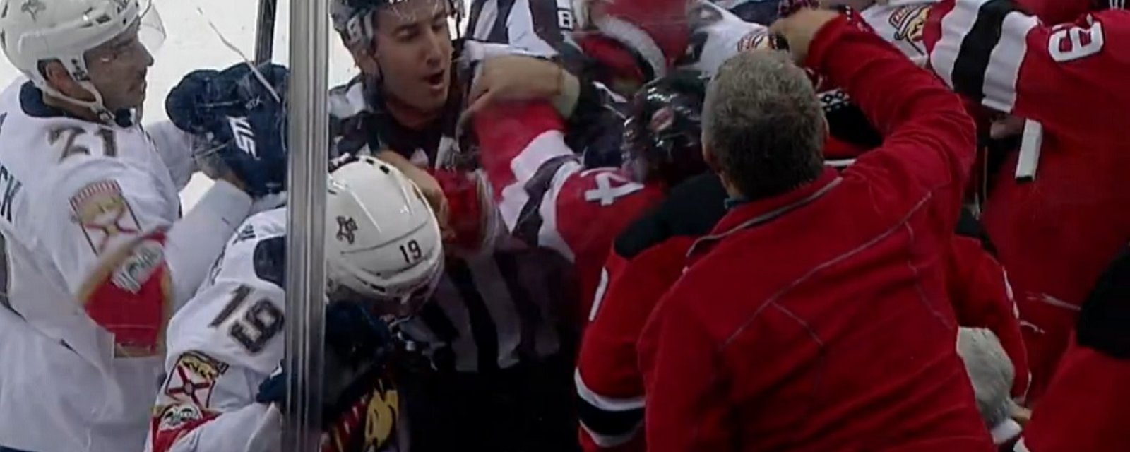 Panthers mob Henrique after he knocks down Roberto Luongo.