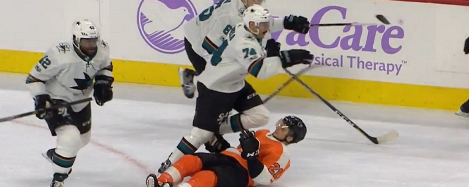 Laughton injured after taking a questionable hit and a knee to the head.